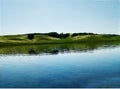 Lake on a quiet shore in a shining raging sky and beautiful scenery