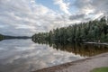 Lake Ragnerudssjoen mirror in Dalsland Sweden beautiful nature forest pinetree swedish Royalty Free Stock Photo