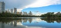 Lake reflecting on the water the city and the blue sky