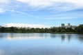 Lake reflecting on the water the city and the blue sky