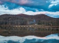 Lake Reflection at Sunset with Pier Dock Foot Path Royalty Free Stock Photo