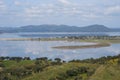 Lake reservoir water reflection of Alqueva Dam landscape and Monsaraz on the foreground in Alentejo, Portugal Royalty Free Stock Photo