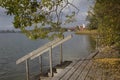 Lake riegsee in autumn, boardwalk with steps into the water Royalty Free Stock Photo