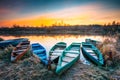 Lake, River and old wooden rowing fishing boat at Royalty Free Stock Photo