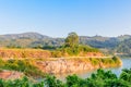 Lake, road, mountain and sky under sunshin in the morning Royalty Free Stock Photo