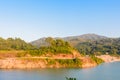 Lake, road, mountain and sky under sunshin in the morning Royalty Free Stock Photo