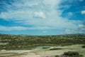 Lake on rocky landscape with domes of an old radar station Royalty Free Stock Photo