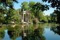 Lake and roman temple of esculapioin a park in Rome