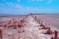 Lake Sasyk Sivash. Extremely salty lake. Pillars from an old destroyed wharf Royalty Free Stock Photo