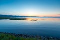 Lake Sevan in Armenia in the rays of the rising morning sun Royalty Free Stock Photo