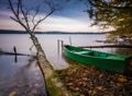 Lake shore with moored boat. Long exposure Royalty Free Stock Photo