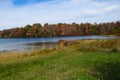 Lake shoreline in autumn foliage Royalty Free Stock Photo