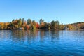 Lake side houses in the fall Royalty Free Stock Photo