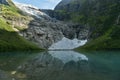 view of the mountain glacier with its reflection in the lake Royalty Free Stock Photo