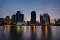 Lake and skyscrapers in Bangkok at dawn