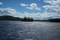 Lake Squam islands and mountains from boat Royalty Free Stock Photo