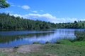 lake surrounded by forest and hills