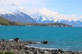 Lake Tekapo to mountains with snow on peaks NZ