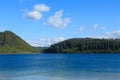 Lake Tikitapu near Rotorua, New Zealand, surrounded by forested hills