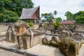 Lake Toba, Indonesia - circa february, 2019: Batak traditional graveyard at Tomok village, lake Toba, travel destination in Royalty Free Stock Photo