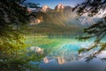 Lake Tovel reflection symmetry in Trentino-Alto Adige, Dolomites, Italy