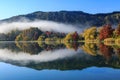 Morning mist rising from a beautiful New Zealand lake in autumn Royalty Free Stock Photo
