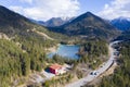 Lake urisee next to highway with hotel in austrian mountains Royalty Free Stock Photo