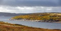 Lake with vegetation in the tundra in autumn. Kola Peninsula, Russia