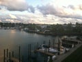 Lake View of Pier and Boats with Dramatic Clouds Overhead Royalty Free Stock Photo