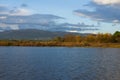 Lake view at sunset with Gardunha mountains on the background at sunset in Castelo Branco, Portugal Royalty Free Stock Photo