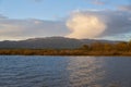 Lake view at sunset with Gardunha mountains on the background at sunset in Castelo Branco, Portugal Royalty Free Stock Photo