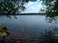 Lake View through trees Royalty Free Stock Photo