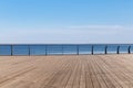 Lake view and wooden floor with railing Royalty Free Stock Photo