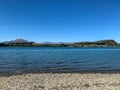 Lake Wanaka and the Southern Alps, with surrounding landscape in Wanaka, Otago, South Island, New Zealand Royalty Free Stock Photo