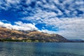 Lake Wanaka view with beautiful hills covered with mountains Royalty Free Stock Photo