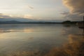 Lake water horizon landscape. Sunset. Reflection of sunset in the lake, beautiful colors, Background Royalty Free Stock Photo