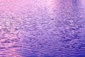 Lake water surface ripple blue and purple Royalty Free Stock Photo