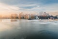 Lake in winter early morning with winter fogs in Zebrzydowice, Silesia, Poland with palace park, pier and frozen swimming pool. Royalty Free Stock Photo