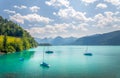 Lake Wolfgangsee with sailing boats, sailboat anchored in a lake covelake, Alps, Austria Royalty Free Stock Photo