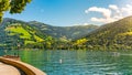 Lake Zell, German: Zeller See, and mountains on the backround. Zell am See, Austrian Alps, Austria Royalty Free Stock Photo