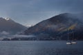 Lake Zell am See in Austrian Alps in Autumn with boats in the foreground Royalty Free Stock Photo