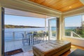 Lakefront home interior shows the covered deck Royalty Free Stock Photo