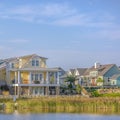 Lakefront homes along Oquirrh Lake against sky