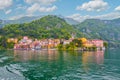 Lakefront of Varenna village seen from ferry departs Lake Como to Bellagio in Italy Royalty Free Stock Photo