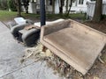 pile of furniture discarded to the curb Royalty Free Stock Photo