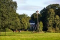 Lakenvelder cows graze on the meadows of the Oostergeest estate in the south-holland village of Warmond. Royalty Free Stock Photo