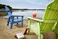 Lakeside beach lounging with a beverage Royalty Free Stock Photo