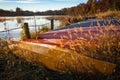 Lakeside canoes upside down in autumn Royalty Free Stock Photo