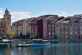 Lakeside front view of the Italian Portofino Bay Hotel. Travel Postcard.