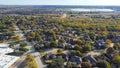 Lakeside master planned community urban sprawl mixed of single-family homes and apartment complex, downtown building distance